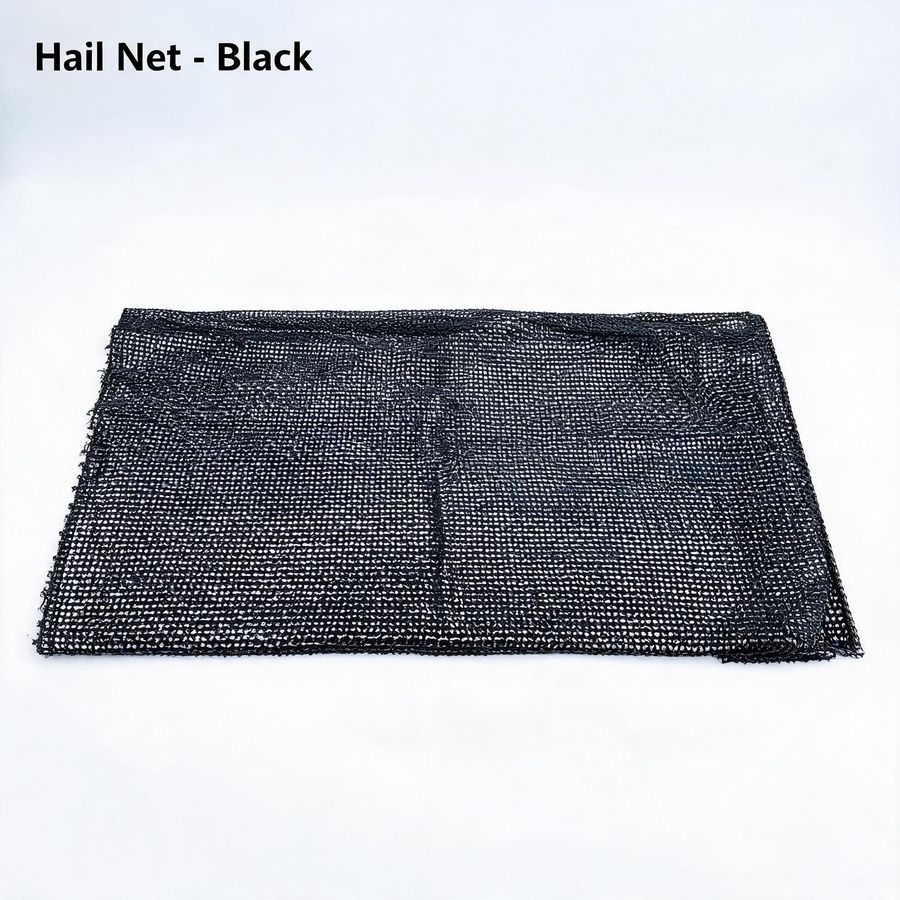 Black hail protection net used over vineyard rows